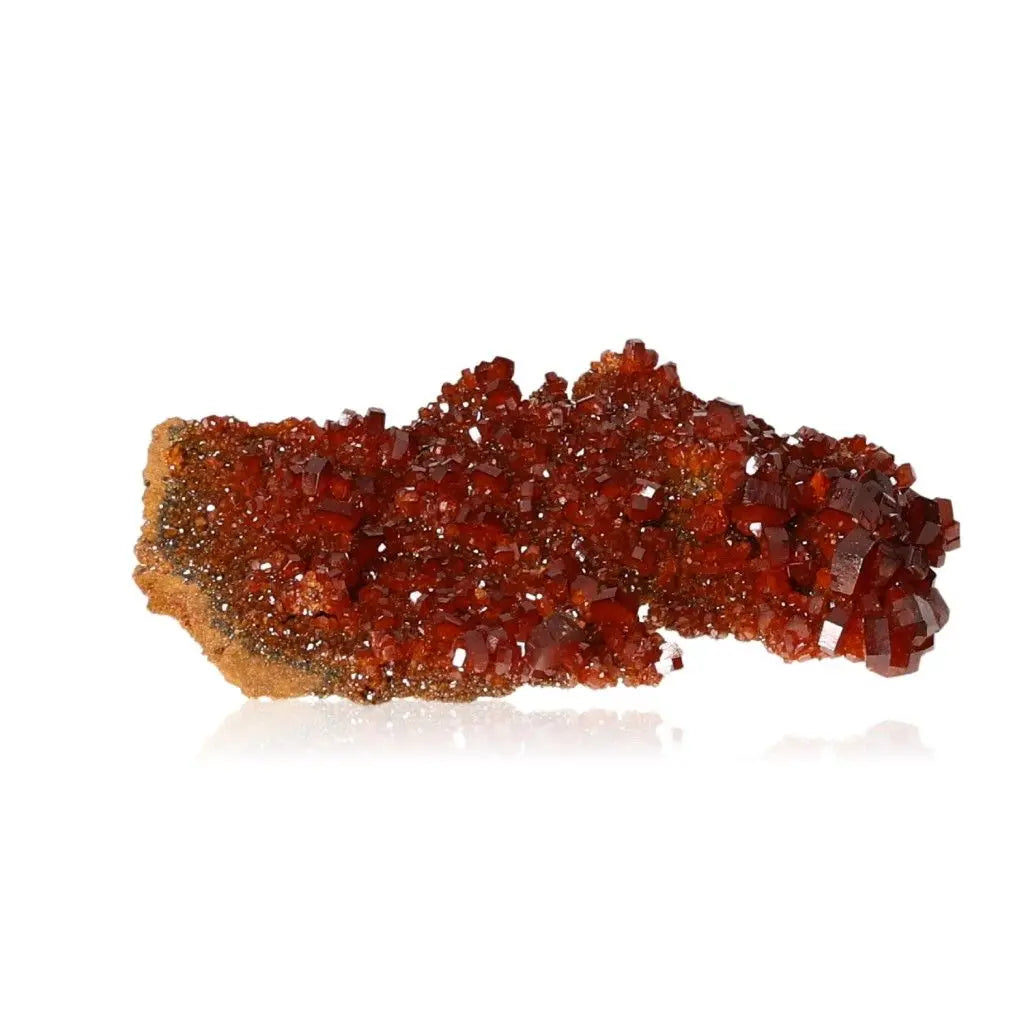 Vibrant red-orange vanadinite druze with intricate crystal formations, ideal for enhancing focus and creativity, perfect for collectors.