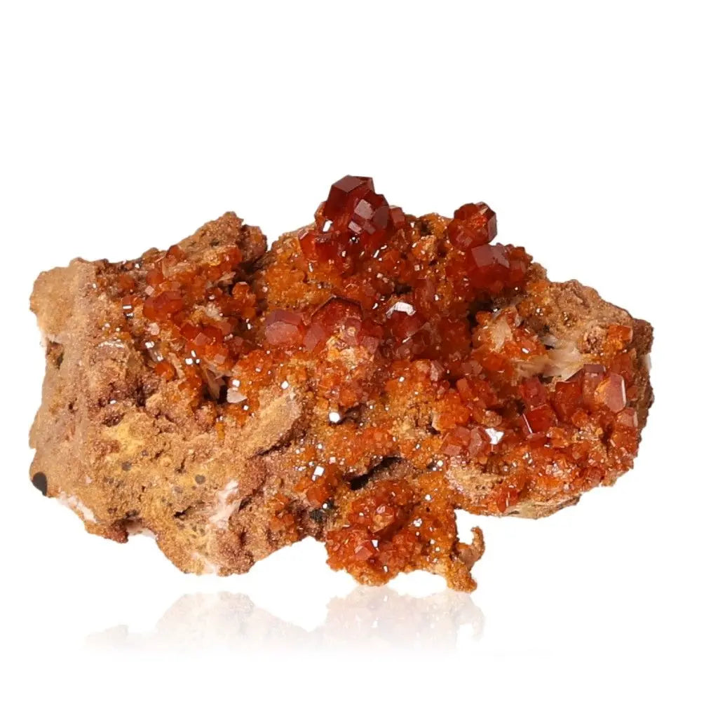 Vanadinite druze with vibrant red-orange crystals, known for focus and creativity enhancement, ideal for collectors and creatives.