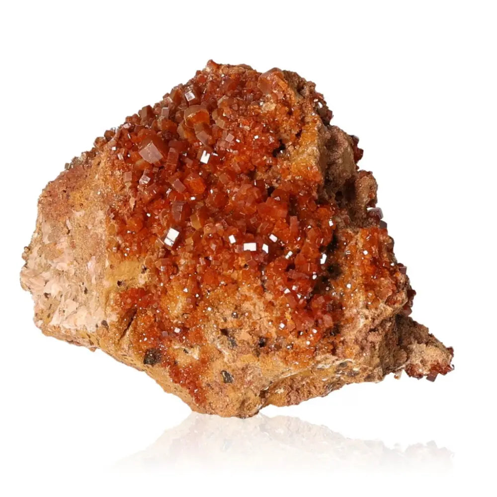 Vanadinite Druze with vibrant red-orange crystals, ideal for focus and creativity, showcased on a white background.