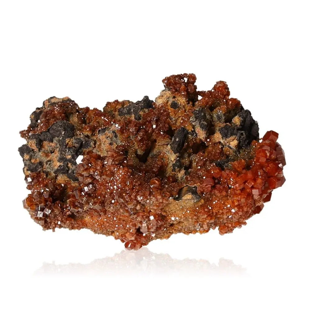 Vanadinite druze crystal with vibrant red-orange hues, showcasing unique formations for focus and creativity enhancement.