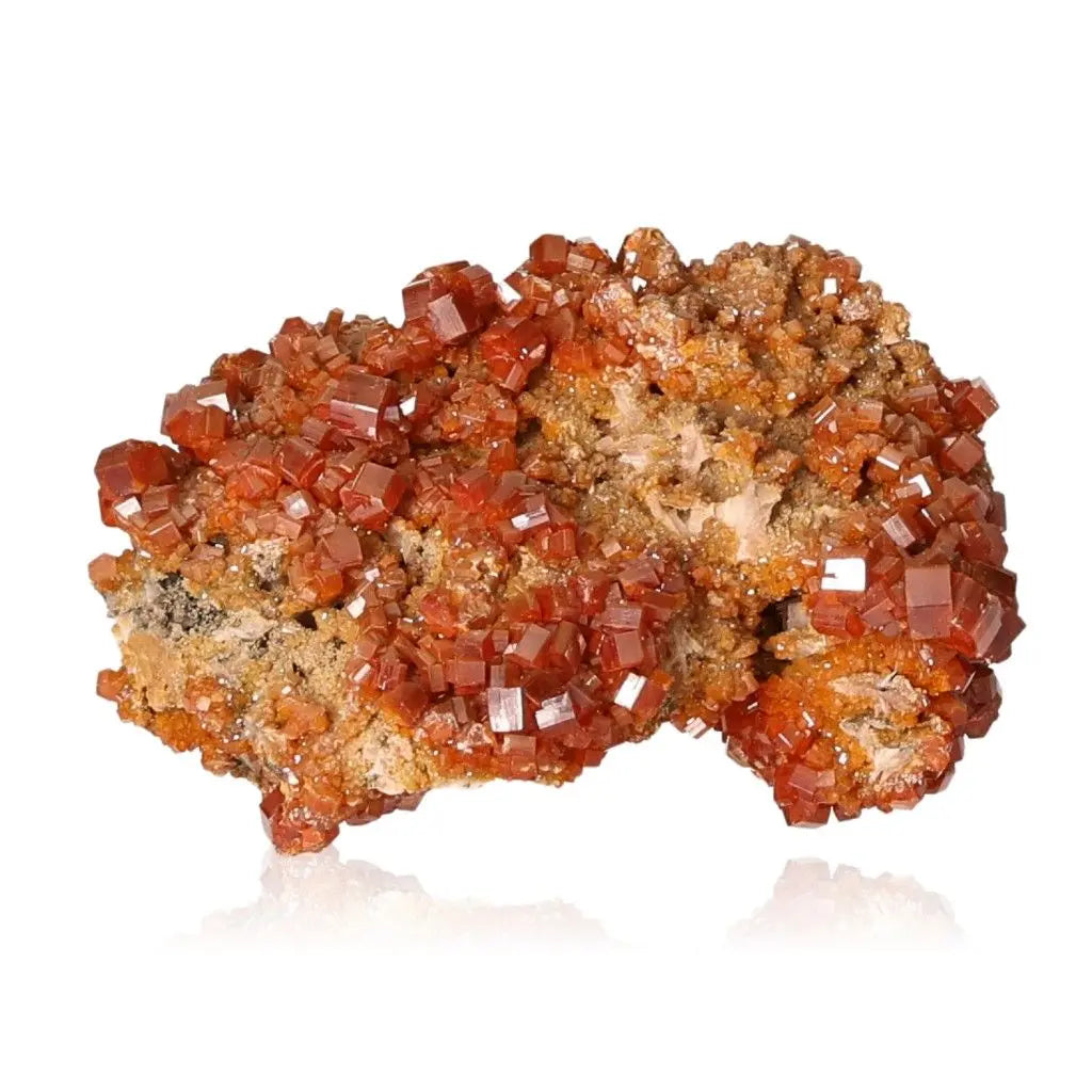 Vanadinite Druze mineral showcasing vibrant red-orange hues and unique crystal formations, ideal for creativity and focus enhancement.