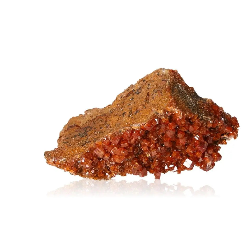 Vanadinite Druze mineral with vibrant red-orange crystals, perfect for enhancing creativity and focus. Ideal for collectors and enthusiasts.