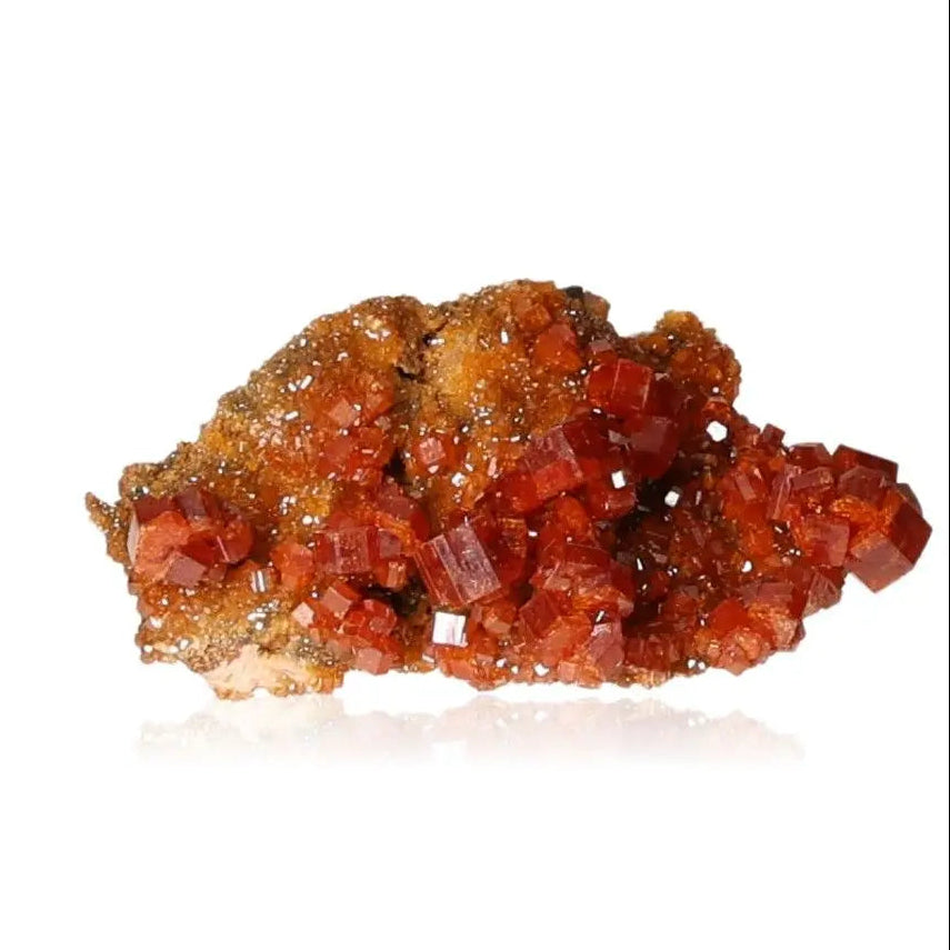Vanadinite druze crystal with vibrant red-orange hues, ideal for focus and creativity in mineral collections.