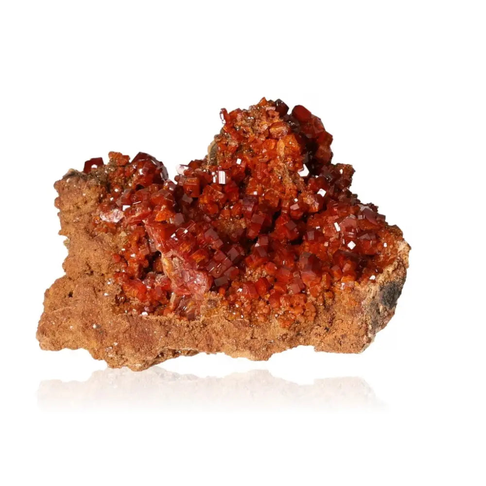 Vibrant Vanadinite Druze crystal with red-orange hues showcasing unique formations, ideal for collectors and enhancing focus.