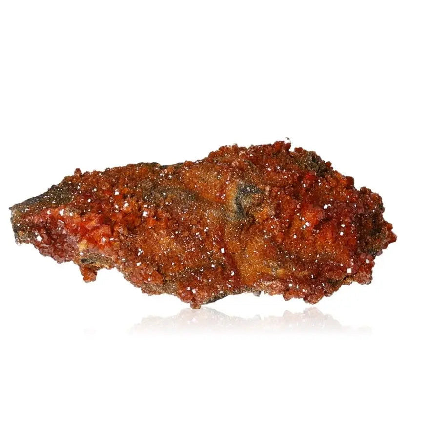 Vibrant vanadinite druze showing fiery red-orange crystal formations, perfect for collectors and enhancing focus and creativity.
