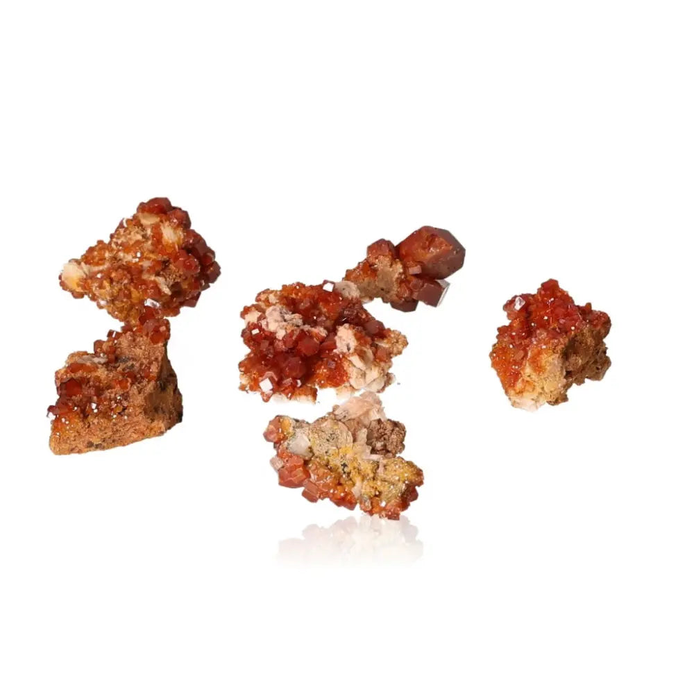 Small Vanadinite druzy formations displaying vibrant red-orange crystals, ideal for collectors and enhancing focus and creativity.