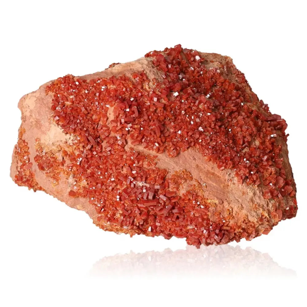 Vanadinite crystal druze showcasing vibrant red-orange hues and unique formations, ideal for focus and creativity enhancement.