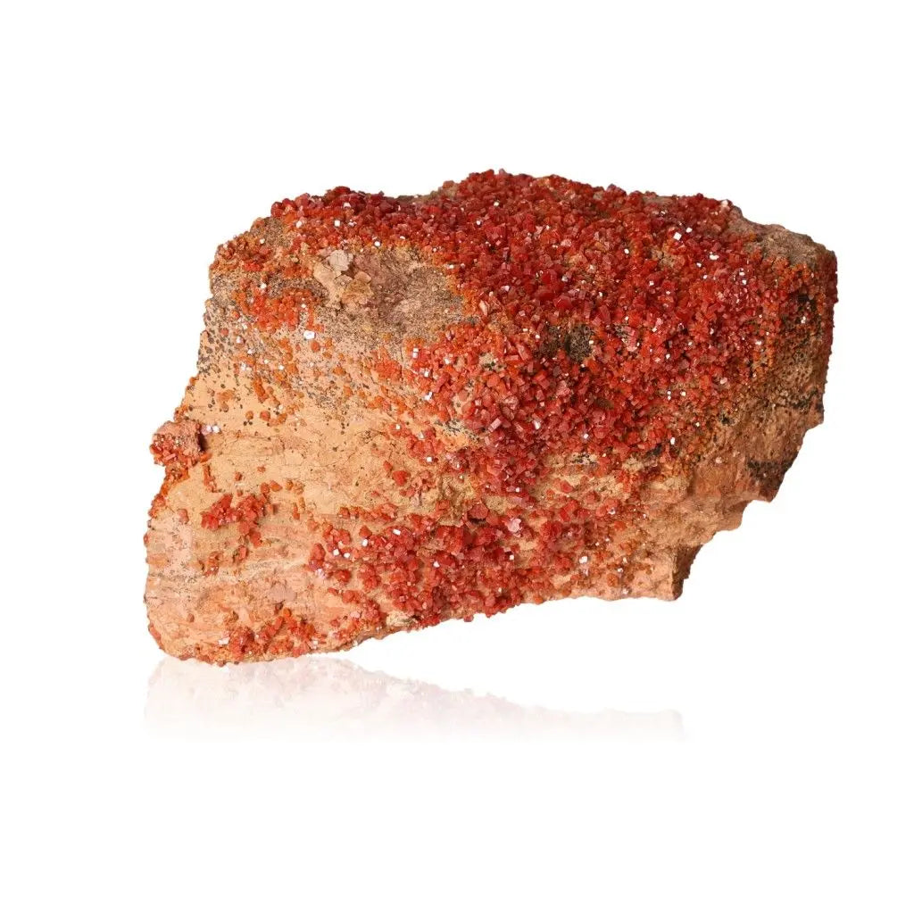 Vanadinite druze crystal with vibrant red-orange hues, ideal for collectors and creatives seeking focus and energy-enhancing properties.