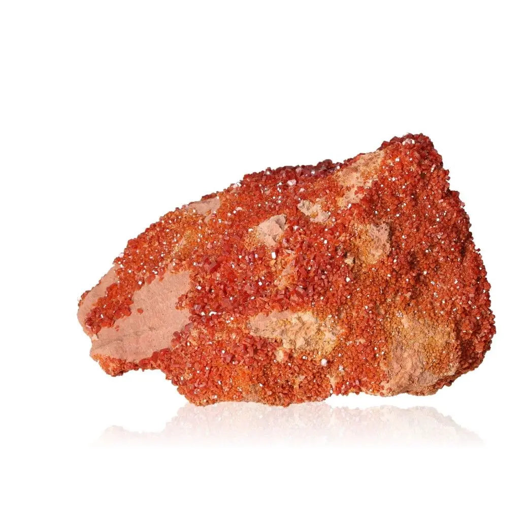 Vibrant red-orange vanadinite druzy with unique crystal formations, ideal for collectors and creativity enhancement.