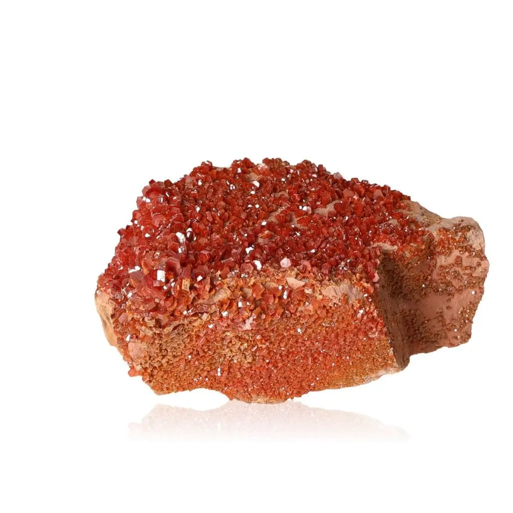 Vibrant red-orange vanadinite druzy crystal with unique formations, perfect for collectors and enhancing focus and creativity.