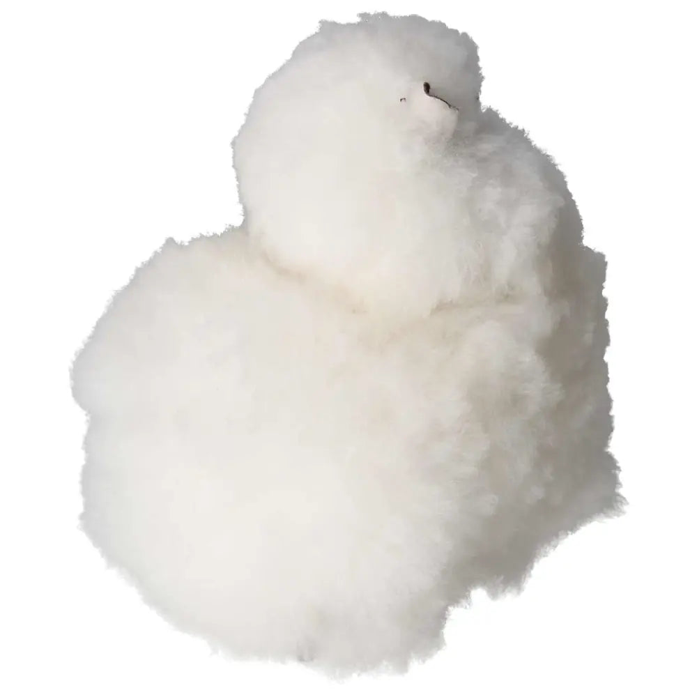 White alpaca plush toy made from 100% natural alpaca hair, handcrafted in Peru. Ethically sourced, soft, and charming.