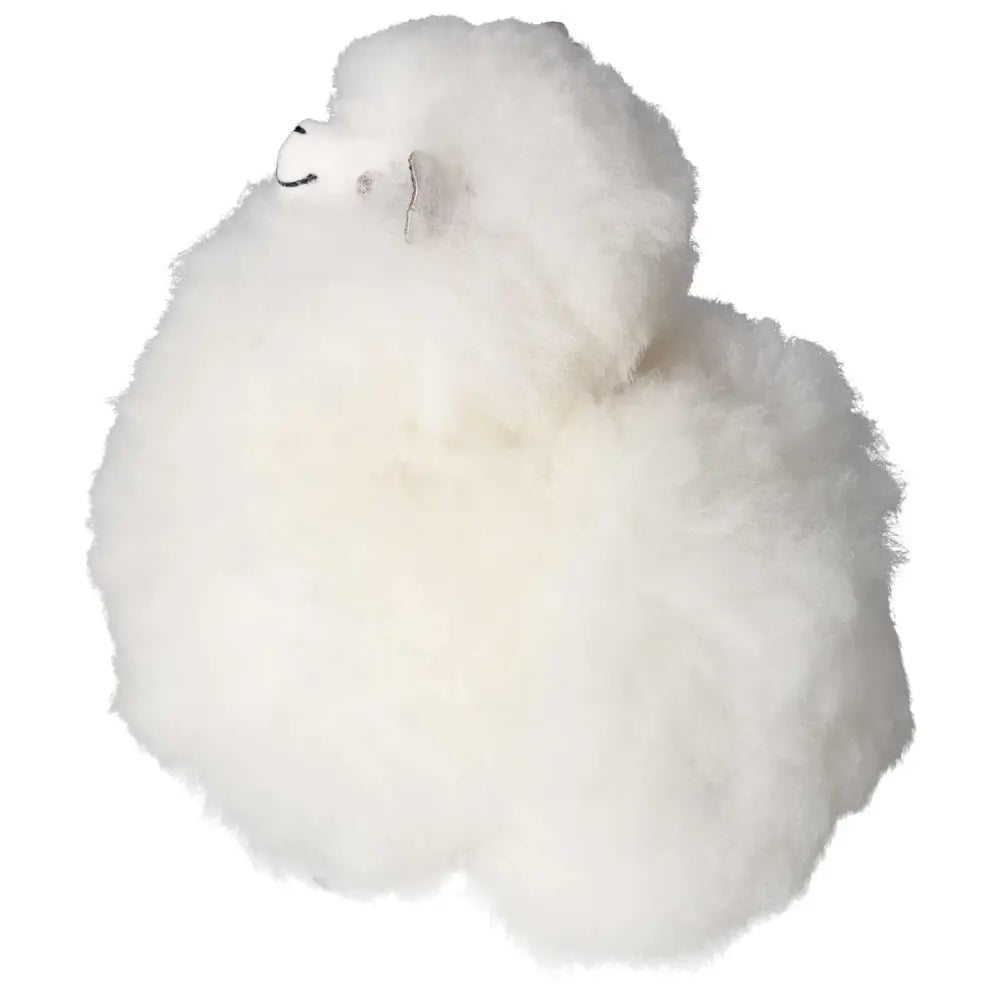 White alpaca plush toy made from 100% natural alpaca hair, handcrafted in Peru. Soft, authentic, and ethically sourced alpaca fiber.