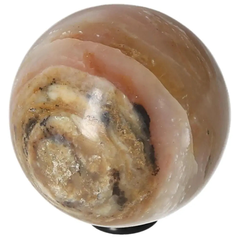 White Onyx Sphere, enhances determination and self-discipline, promotes control and releases past burdens.