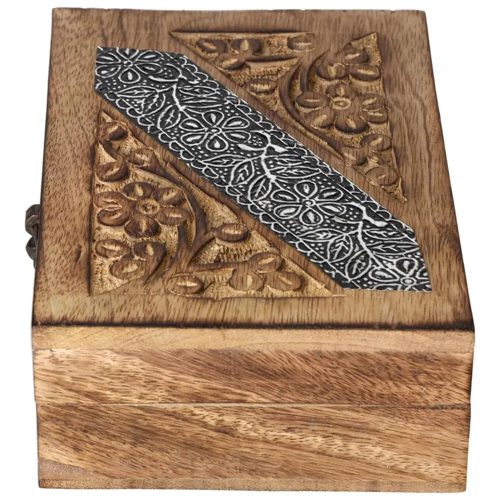 Premium wooden jewelry box with intricate carvings and elegant design by Sylvia Crystals, symbolizing luxury and spiritual connection.