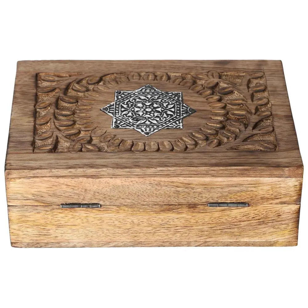 Handcrafted wooden jewelry box with intricate Sylvia Crystals design, showcasing luxury and conscious living.