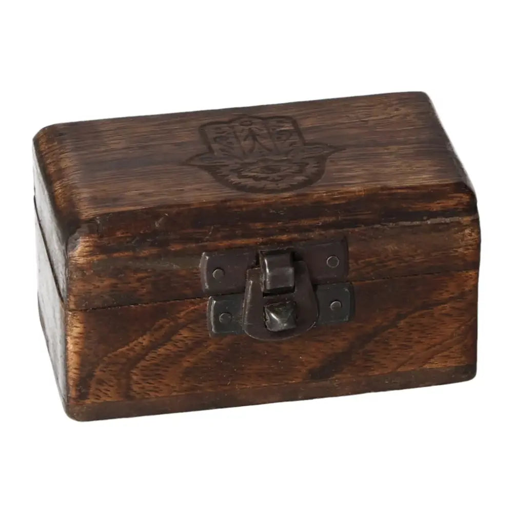 Wooden pill box, 9x5x4cm, featuring carved designs and a secure clasp closure, perfect for storage and decorative purposes.