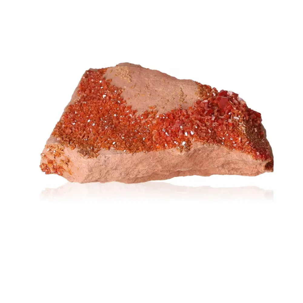 Vibrant red-orange vanadinite druzy mineral for creativity and focus