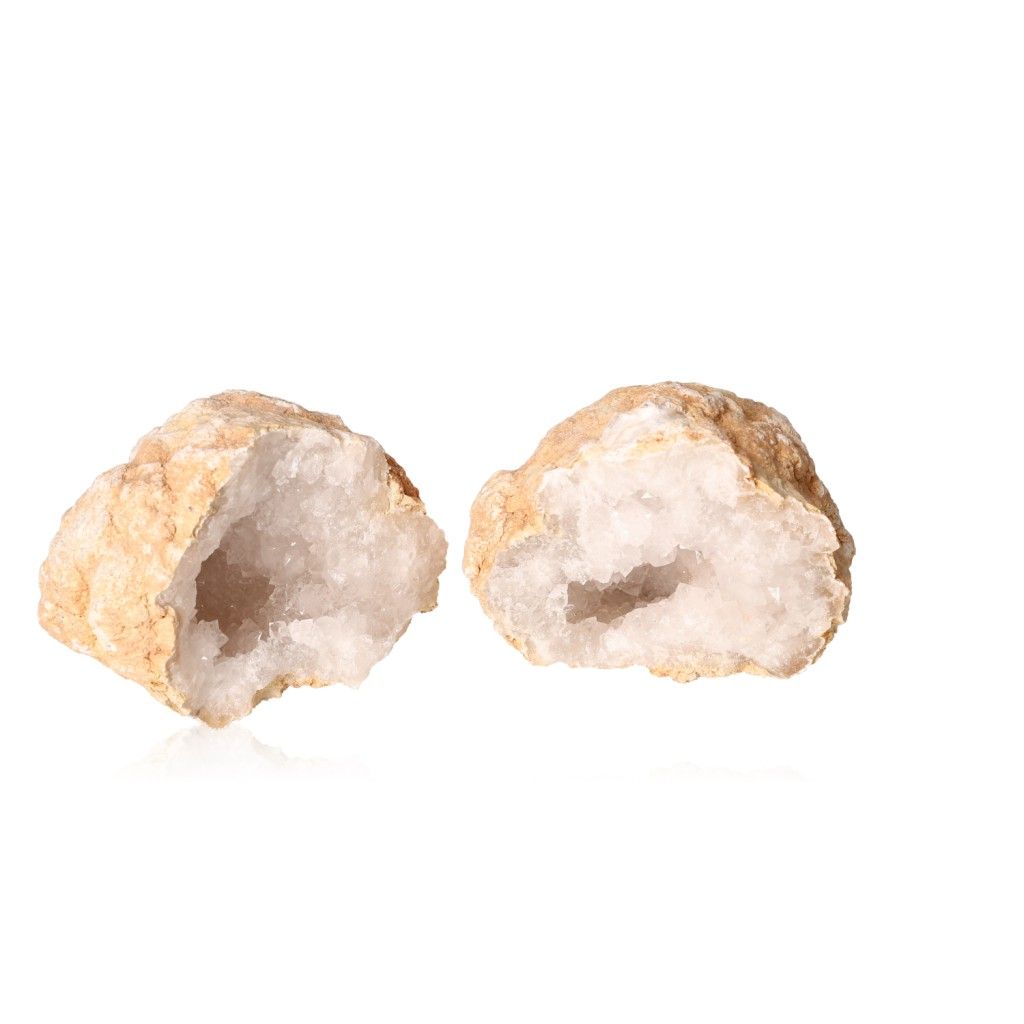 Milky quartz geode with rugged exterior and sparkling white crystals, ideal for energy balance and purification.