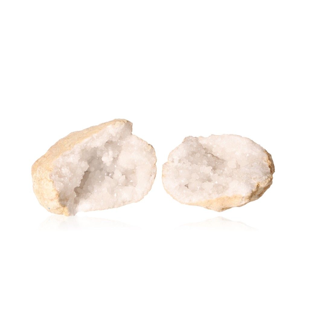 Milky quartz geode with rugged outer shell and sparkling white crystals, ideal for energy balance and promoting tranquility.