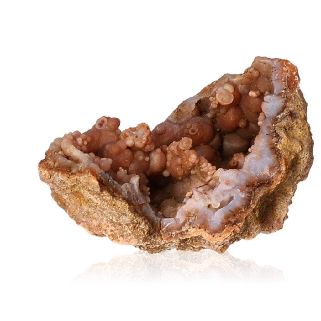 Calcite Stalactite showcasing earthy tones and intricate layers, representing growth and transformation.