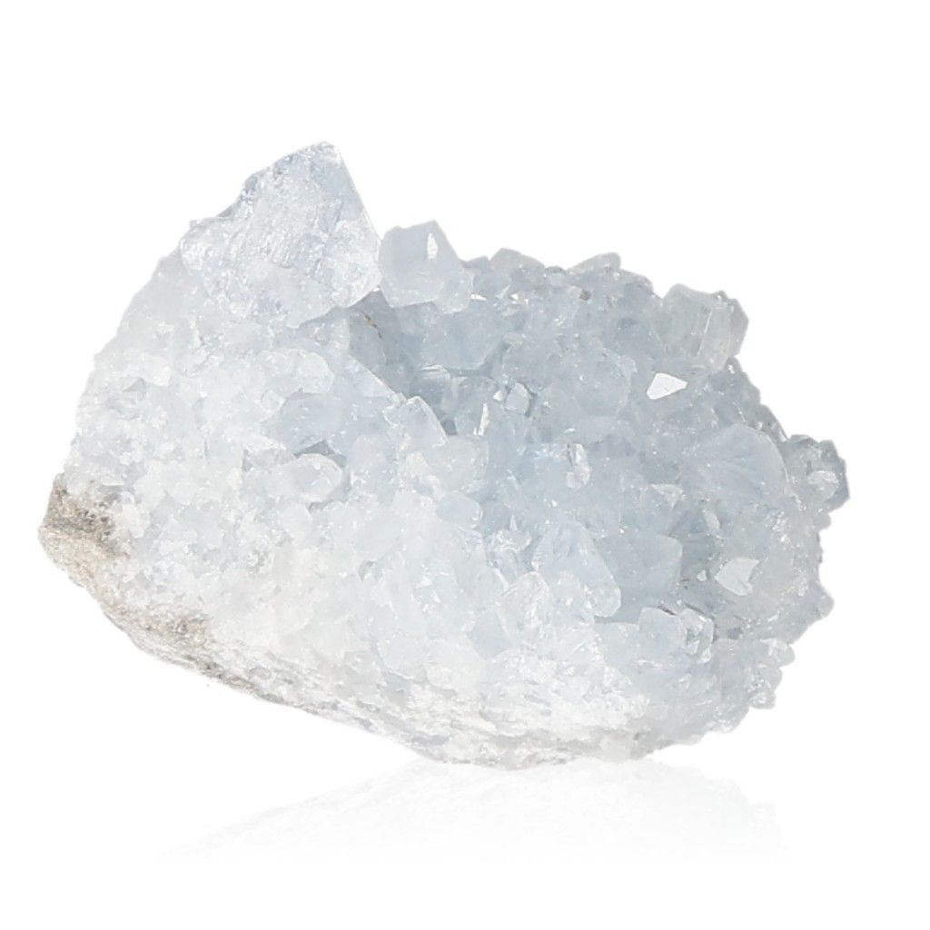 Celestite crystal cluster showcasing tranquil blue hues and spiritual properties for peace, harmony, and divine connection.