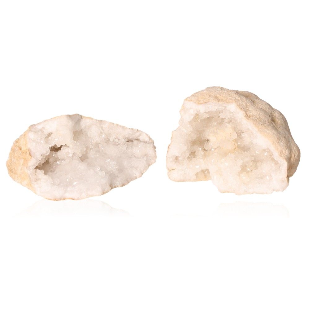 Milky quartz geode with sparkling white crystals and rugged outer shell for energy cleansing and balance.