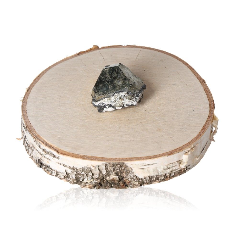 Pyrite druzy stone on wooden disc for inspiration and courage in idea generation and goal achievement.