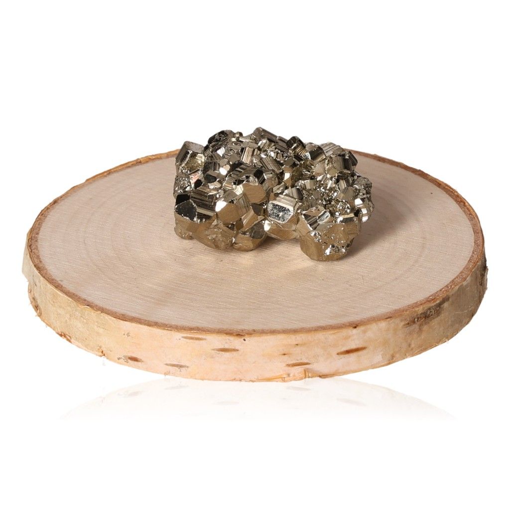 Pyrite druzy cluster on wooden slice, promoting independence and courage for goal achievement and new ideas.