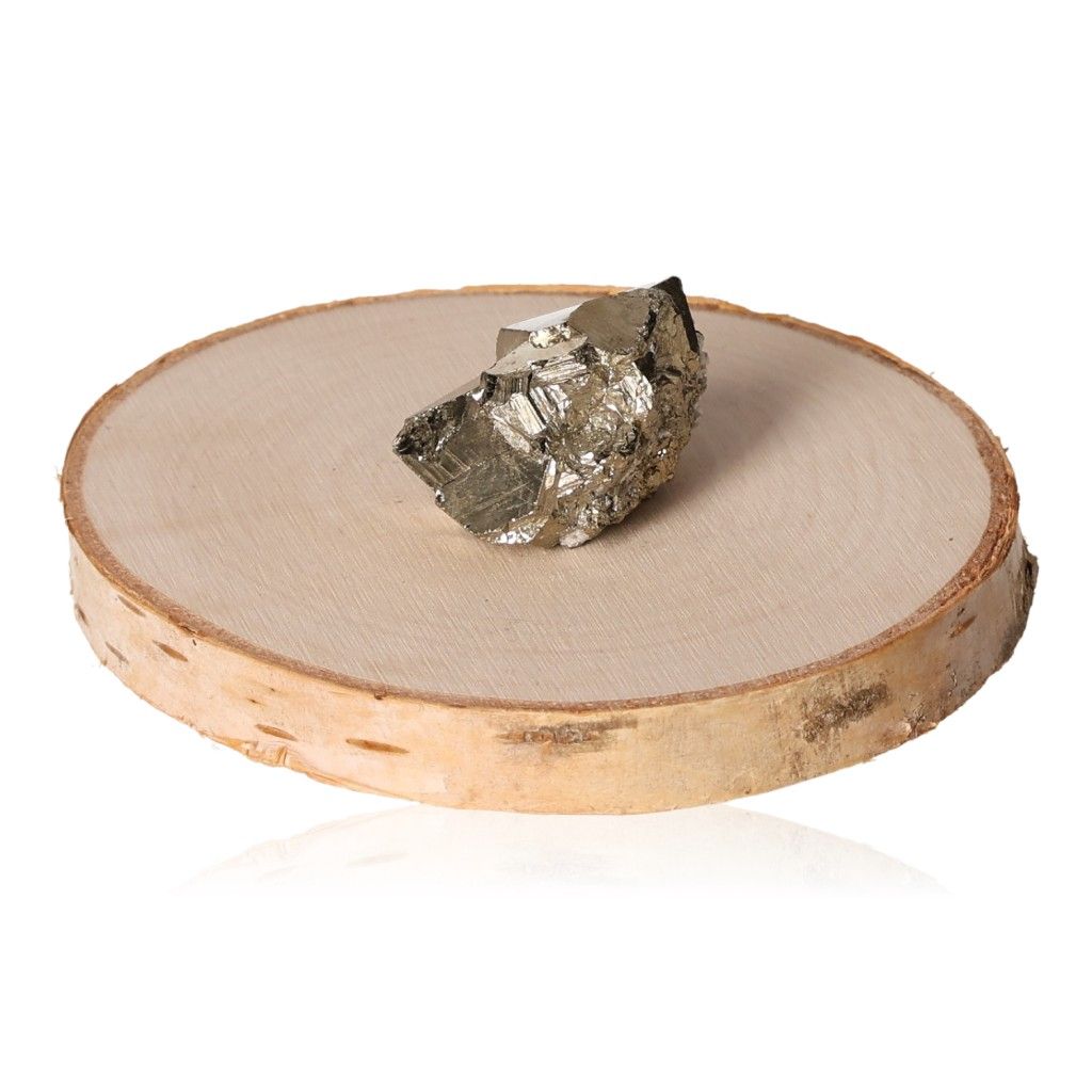 Pyrite druzy crystal on a wooden slice, promoting independence, idea generation, and motivation for goal achievement.