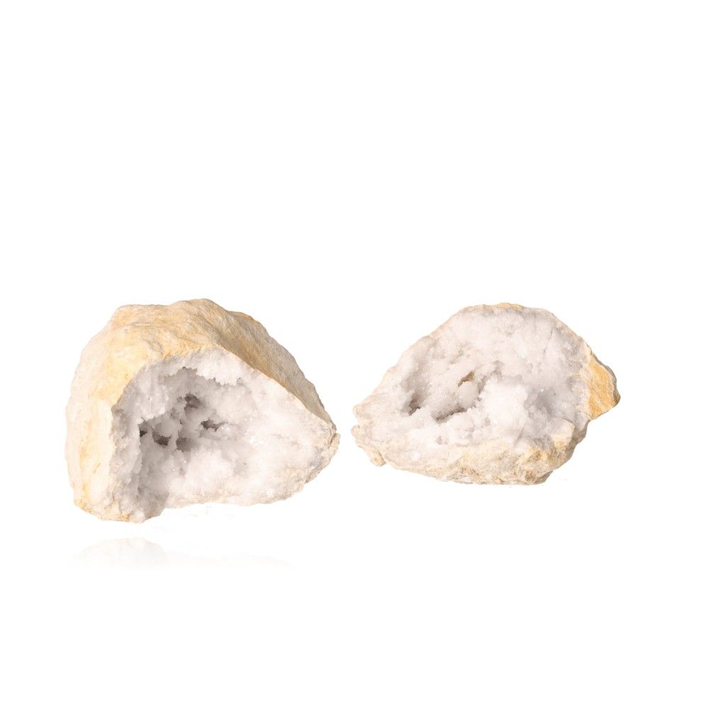 Quartz geode split open revealing sparkling milky white crystals, perfect for energy cleansing and boosting focus.