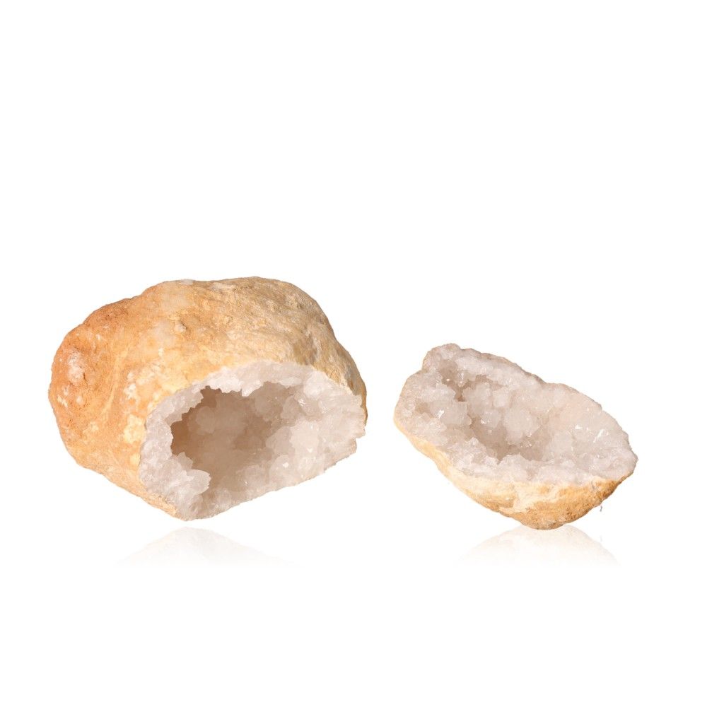 Milky quartz geode split open displaying sparkling white crystals, ideal for energy balance and focus enhancement.