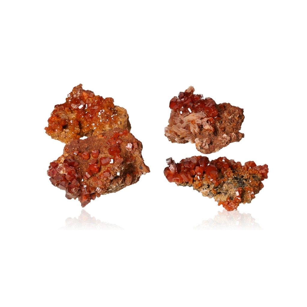 Vanadinite small druzes showcasing vibrant hexagonal crystals in reddish-brown and orange hues with a glassy surface.