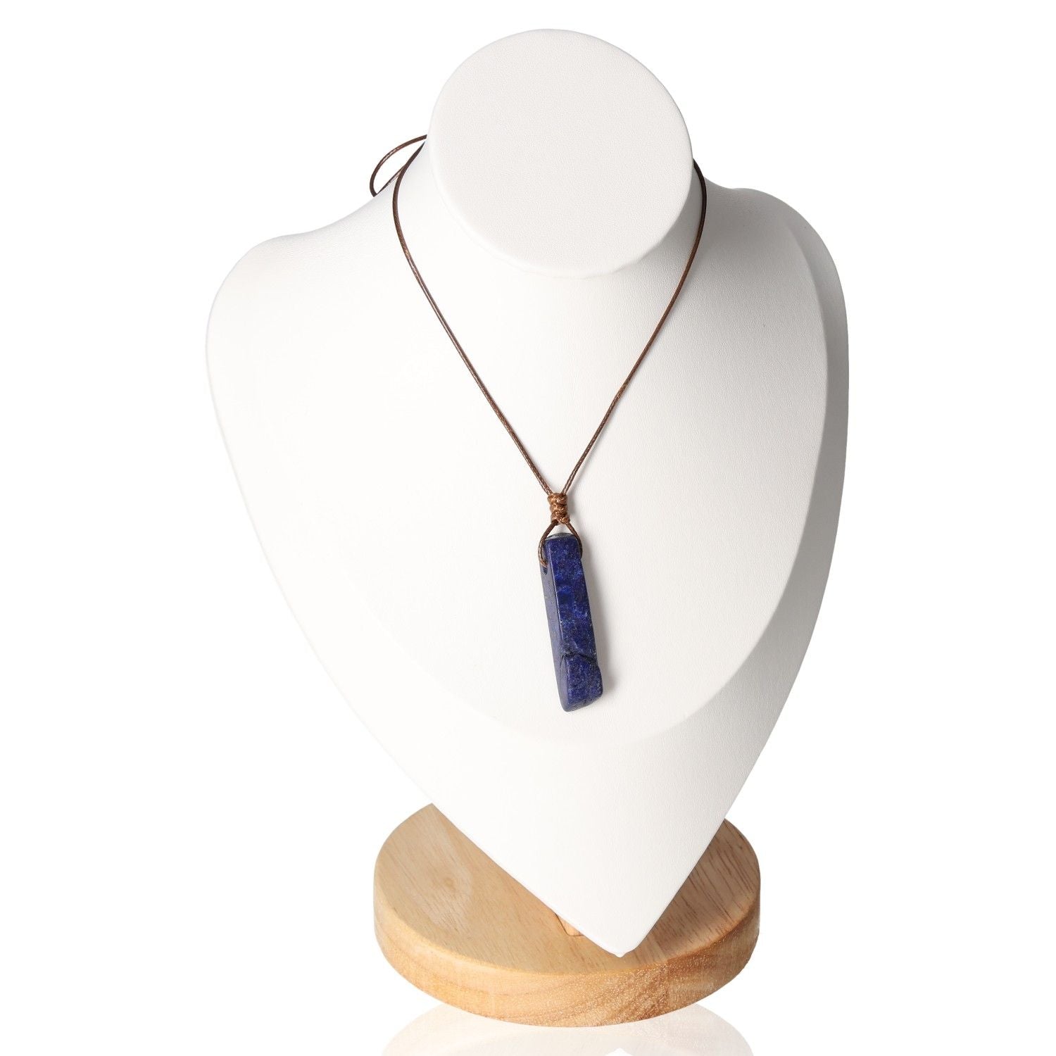 Boho necklace with lapis lazuli pendant on a display bust for bohemian elegance and spiritual growth.