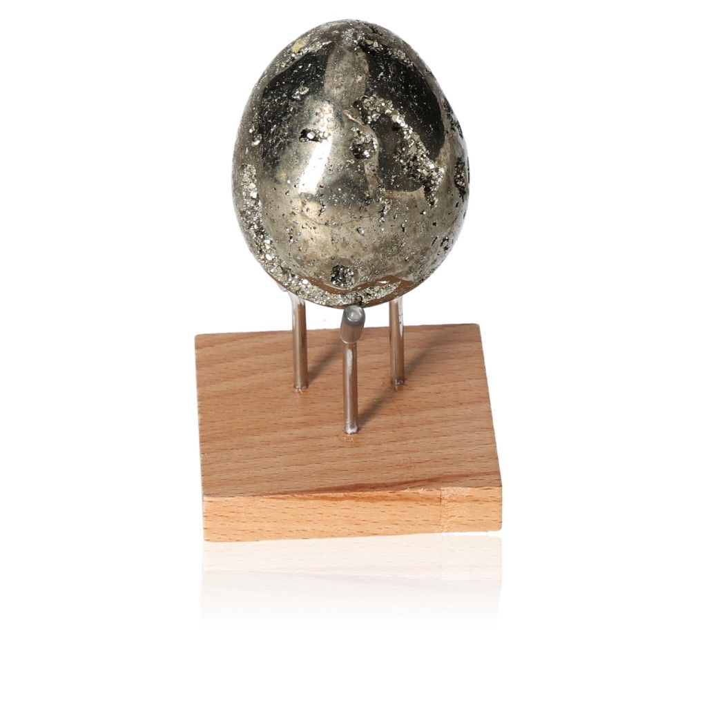 Pyrite egg on wooden stand for inspiration and courage, supports independence and motivates goal achievement in all areas of life.