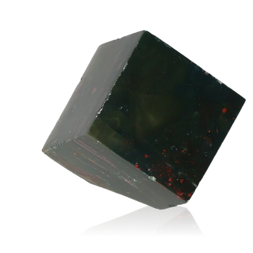 Deep green Bloodstone cube with red spots, known for enhancing vitality and courage, showcasing its grounding and protective properties.