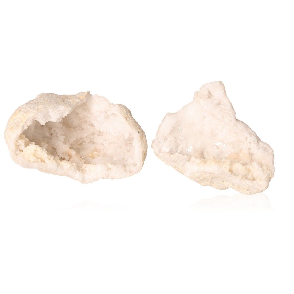 Milky quartz geodes with inner sparkling white crystals, promoting tranquility and energy balance.