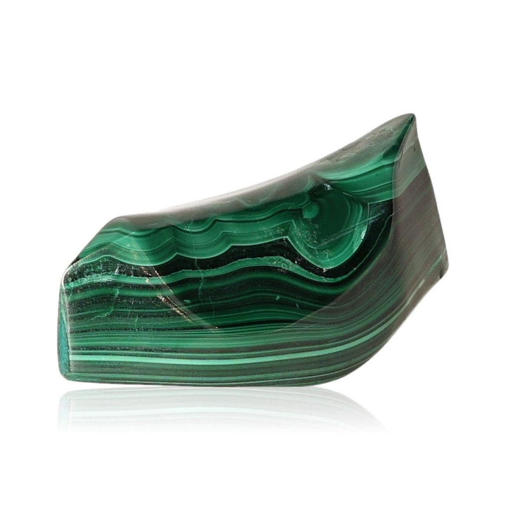 Polished malachite stone with vibrant green bands, known for its soothing energy and supportive healing properties.