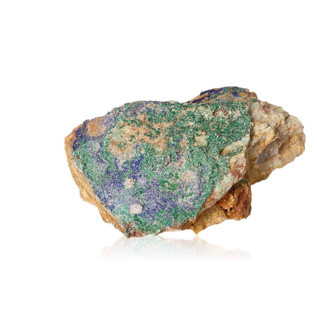 Raw malachite druzy with natural green hues on a white background, showcasing its soothing and energizing properties for harmony.