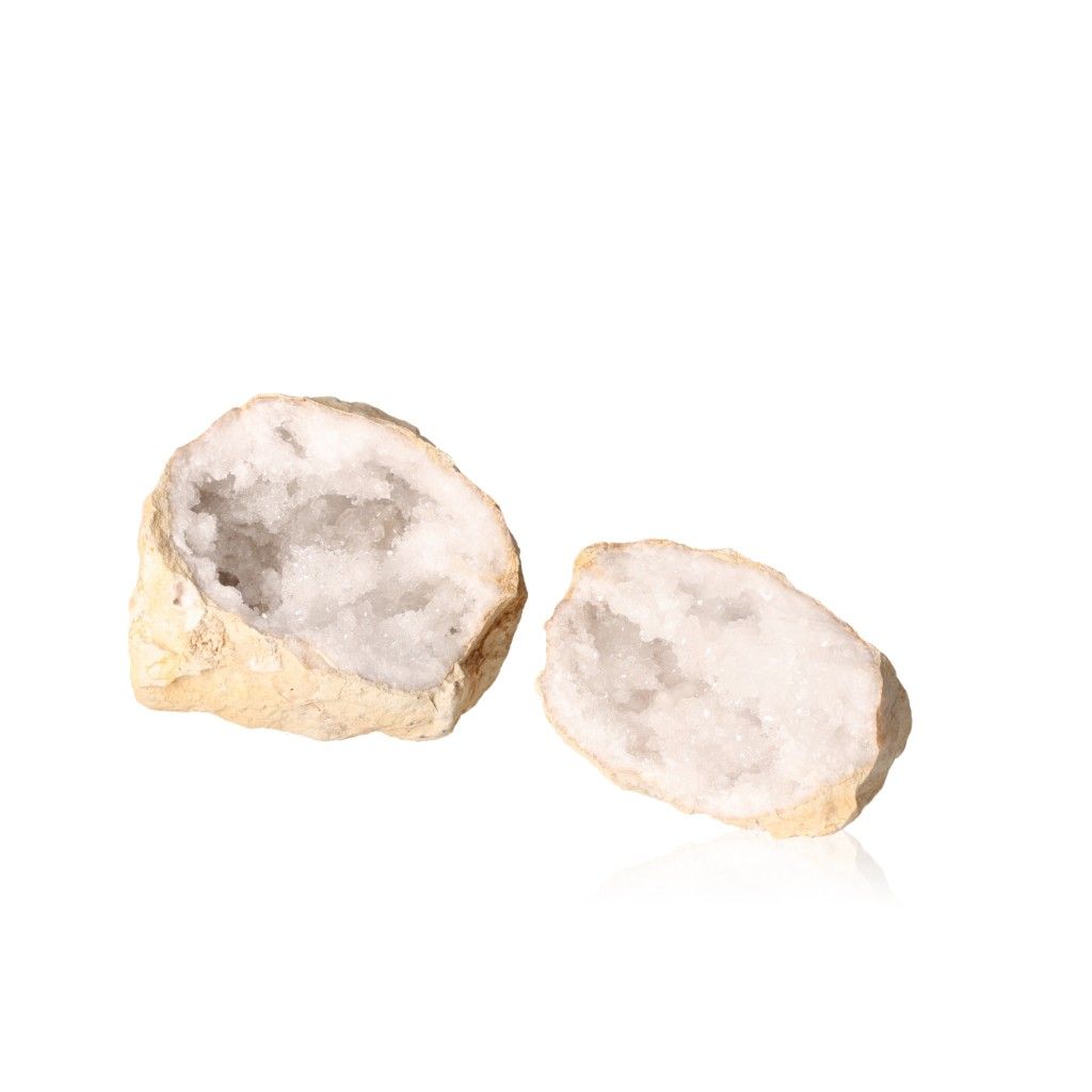 Milky quartz geode with rugged shell and sparkling white crystals, perfect for purifying energy and enhancing focus and tranquility.