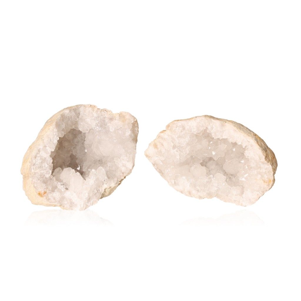 Milky quartz geode halves with sparkling white crystals, ideal for energy cleansing and enhancing focus and tranquility.