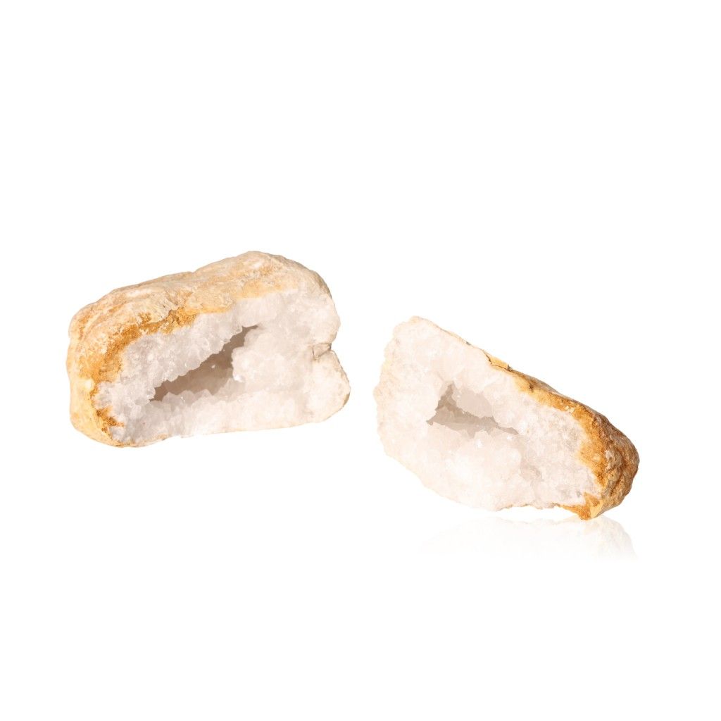 Milky quartz geode with sparkling white crystals, known for purifying energy and enhancing tranquility and clarity.