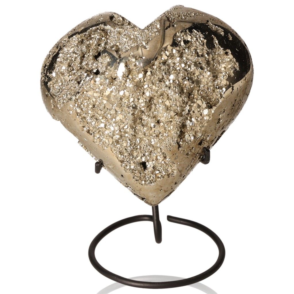 Polished pyrite heart on stand, symbolizing courage and independence, inspiring new ideas and goal achievement.