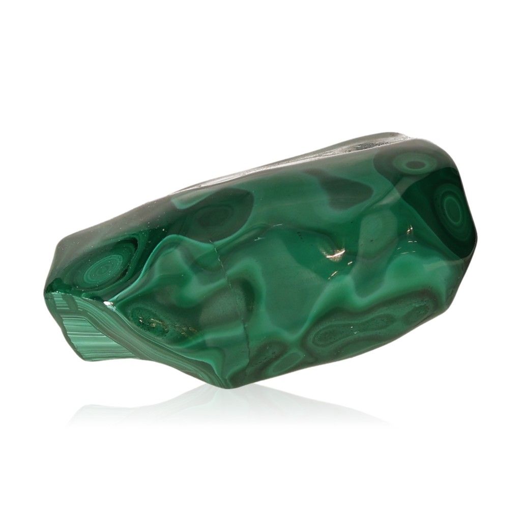 Polished malachite stone with swirling green patterns, symbolizing soothing energy and inner harmony.