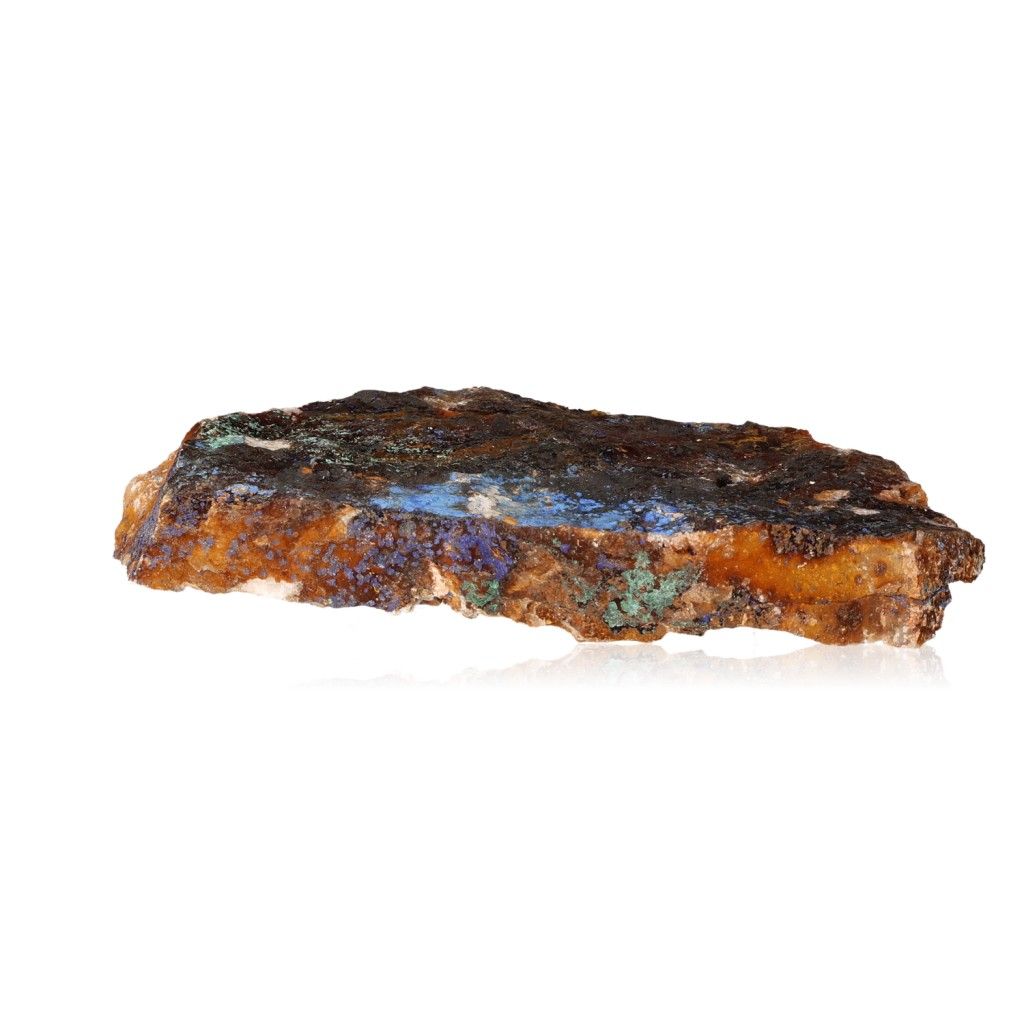 Raw azurite stone with deep blue hues and coppery patterns for mental clarity and spiritual growth.