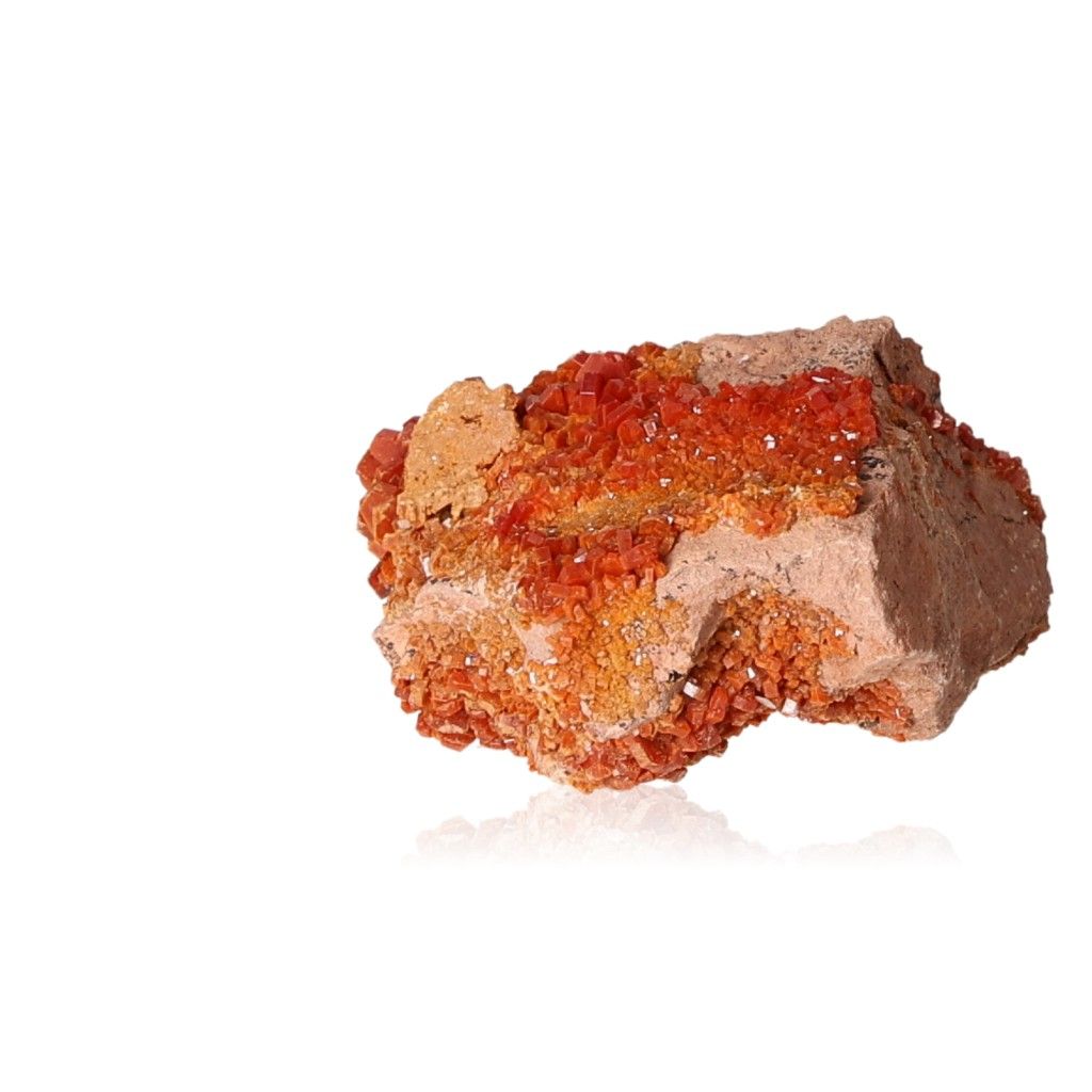 Vanadinite druze crystal stone for focus, motivation, and personal transformation on white background.