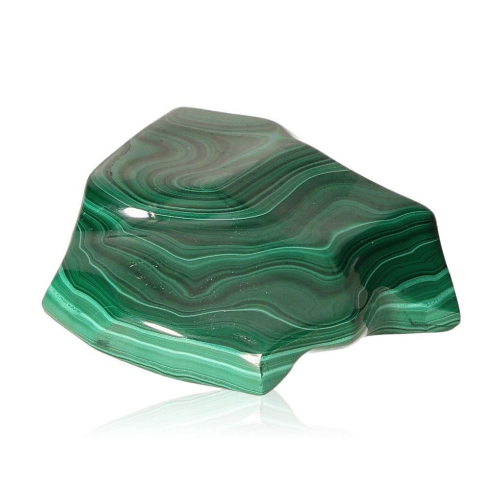 Polished malachite stone with natural green swirls, symbolizing soothing energy and inner harmony.