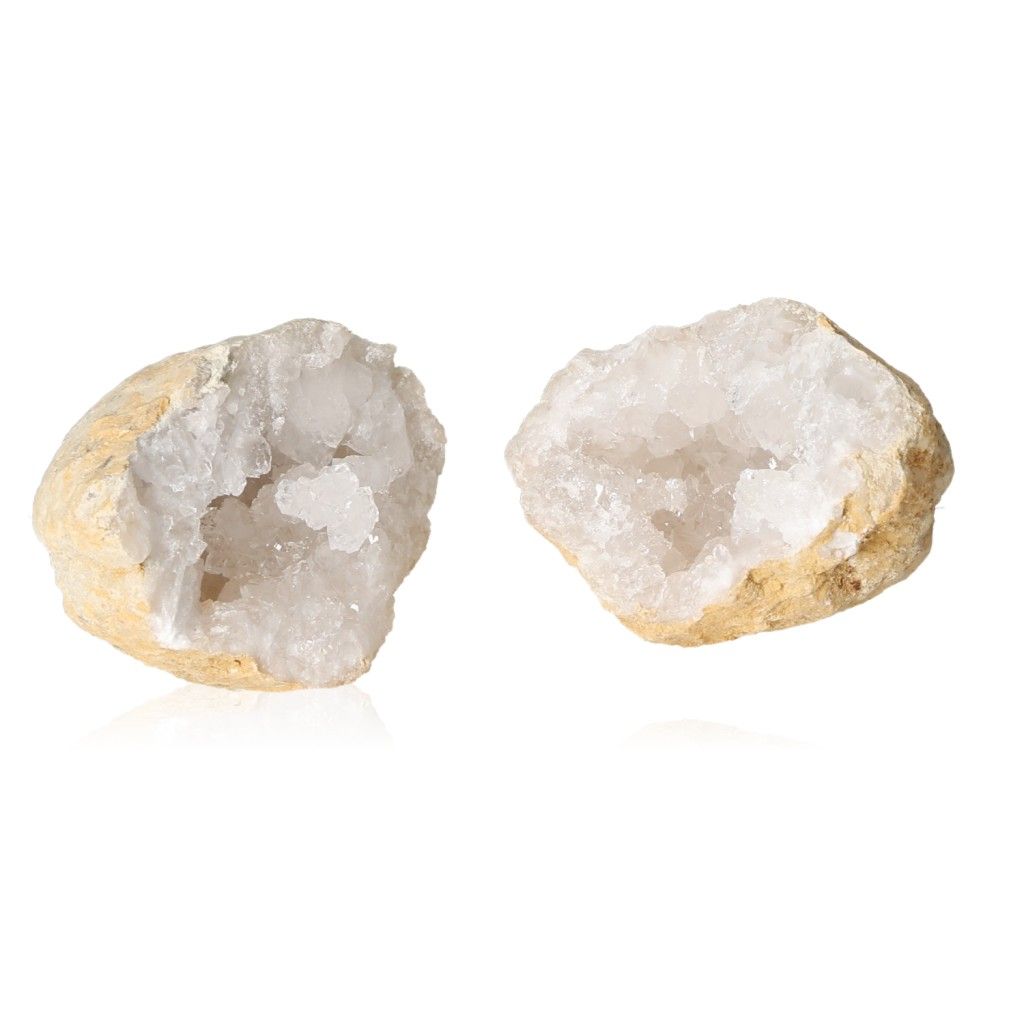 Milky quartz geodes with rugged shells and sparkling white crystals, ideal for enhancing tranquility, focus, and positive energy.