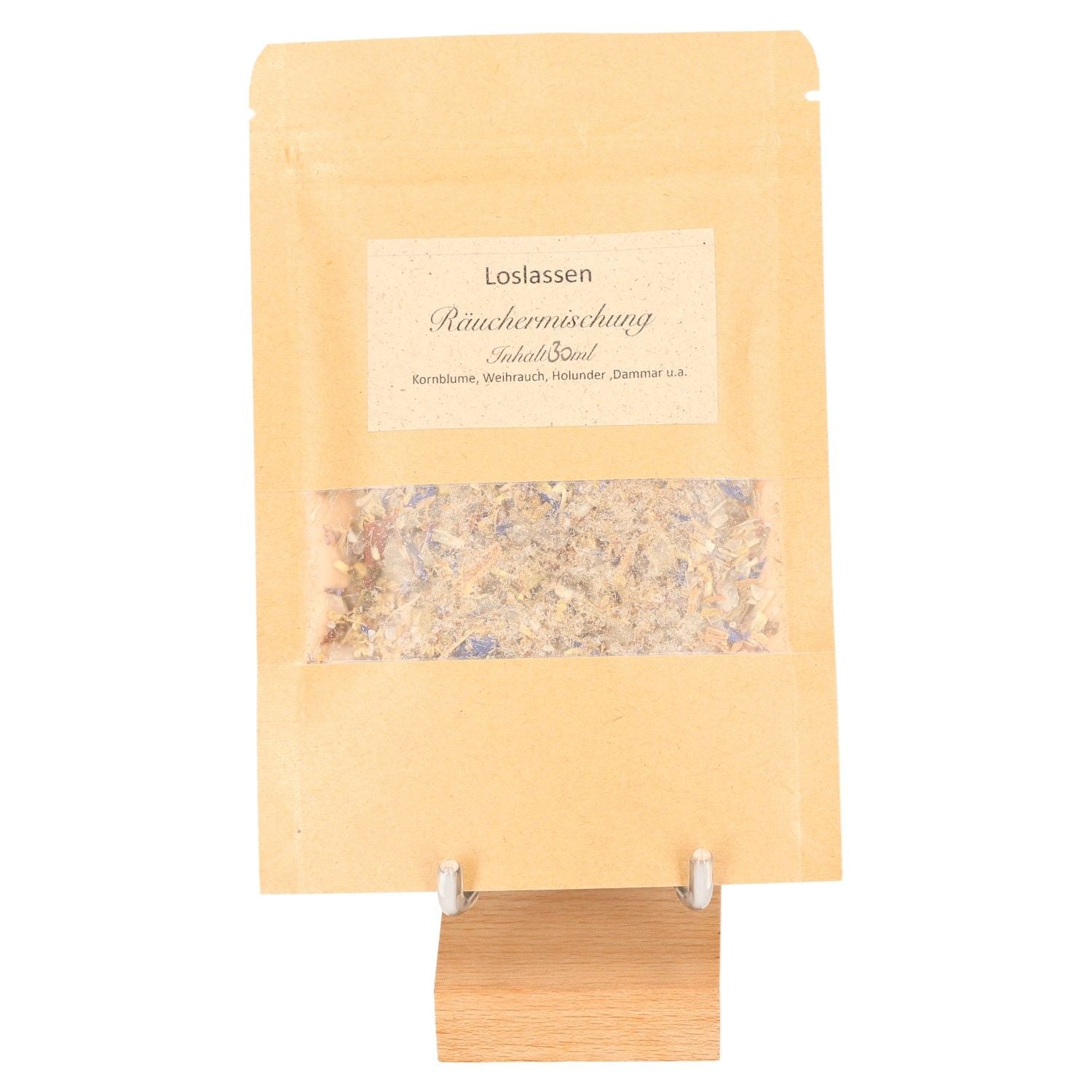 Handcrafted incense blend "Letting Go" featuring sacred elder bush for spiritual release in a brown paper package.