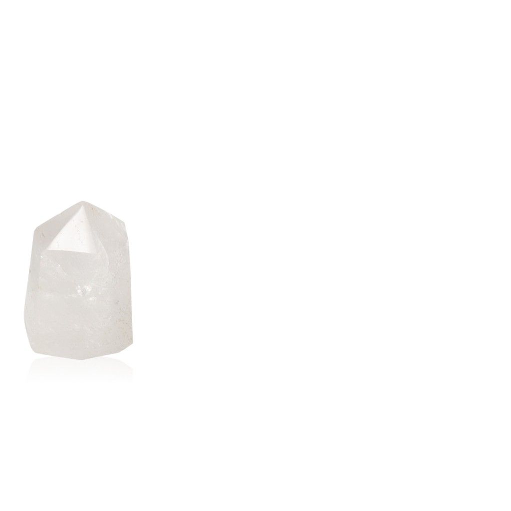 Polished crystal quartz point for chakra healing and zodiac energy balancing.