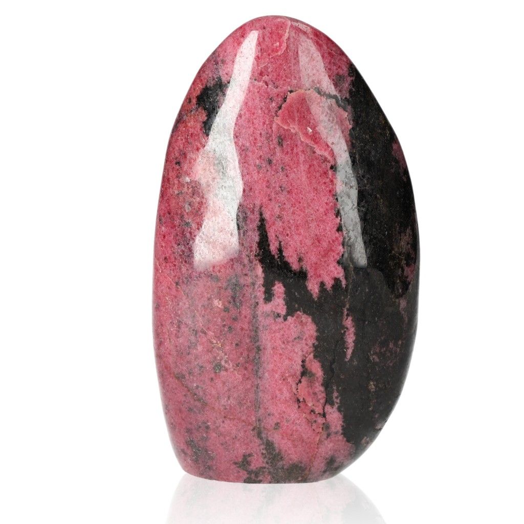 Rhodonite free form crystal with vibrant pink and black patterns for healing and positive energy flow.